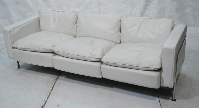 Lot 403  -  Robert Haussman Stendig Leather Sofa Couch.  White leather on stainless steel frame.-- Dimensions:  H: 31 inches: W: 85 inches: D: 32 inches --- 