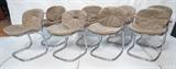 Lot 412  -  Seat of 8 Rima Rinaldi Mario Dining Chairs.  4 Arm, 4 Side. Suede cushions chrome frames.-- Dimensions:  H: 31.5 inches: W: 24 inches: D: 21 inches --- 