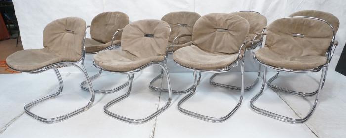 Lot 412  -  Seat of 8 Rima Rinaldi Mario Dining Chairs.  4 Arm, 4 Side. Suede cushions chrome frames.-- Dimensions:  H: 31.5 inches: W: 24 inches: D: 21 inches --- 