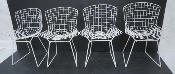Lot 413  -  Set 4 Bertoia Wire Chairs.  Painted white.  -- Dimensions:  H: 29.75 inches: W: 21.25 inches: D: 19.5 inches --- 