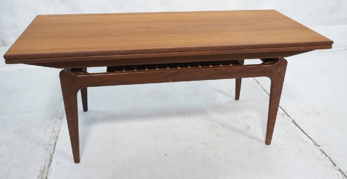 Lot 430  -  Danish Modernist Teak Convertible Coffee Table.  Cocktail table converts into dining table. Raises up in height and flips open to form higher larger dining table. Not marked. -- Dimensions:  H: 21.25 inches: W: 48.25 inches: D: 21.25 inches --- 