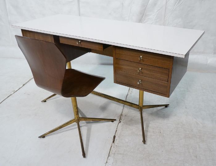 Lot 431  -  Modernist Desk & Chair. White Laminate Top over "Wood" Laminate Base. Great leg form. Molded plywood chair with matching base.-- Dimensions:  H: 30 inches: W: 60 inches: D: 23 inches --- 