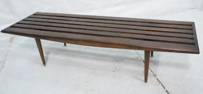 Lot 442  -  American Modern Slat Bench Table. Tapered Peg Legs. -- Dimensions:  H: 13.5 inches: W: 60 inches: D: 19.25 inches --- 