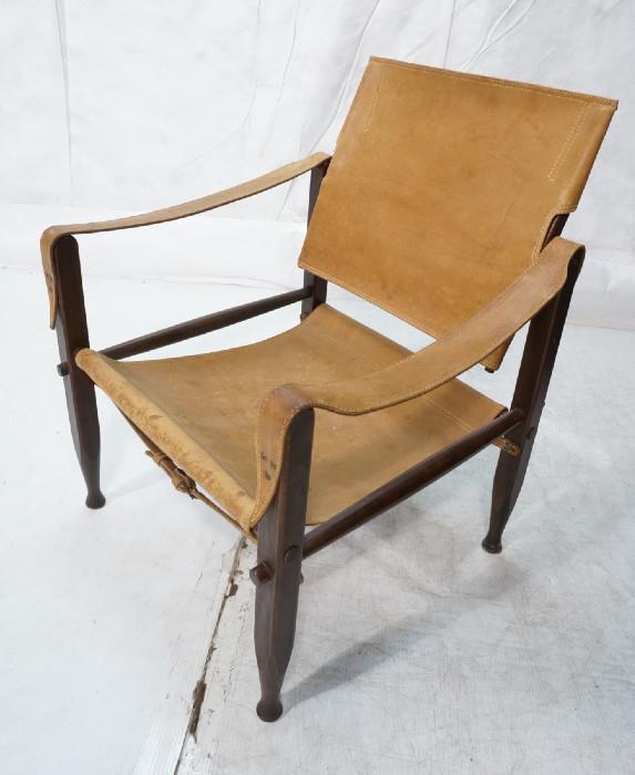 Lot 446  -  Vintage Leather & Wood Safari Chair. Sling Seat & Tilting Back. Labeled Safari Stool. -- Dimensions:  H: 30.5 inches: W: 24 inches: D: 23.5 inches --- 