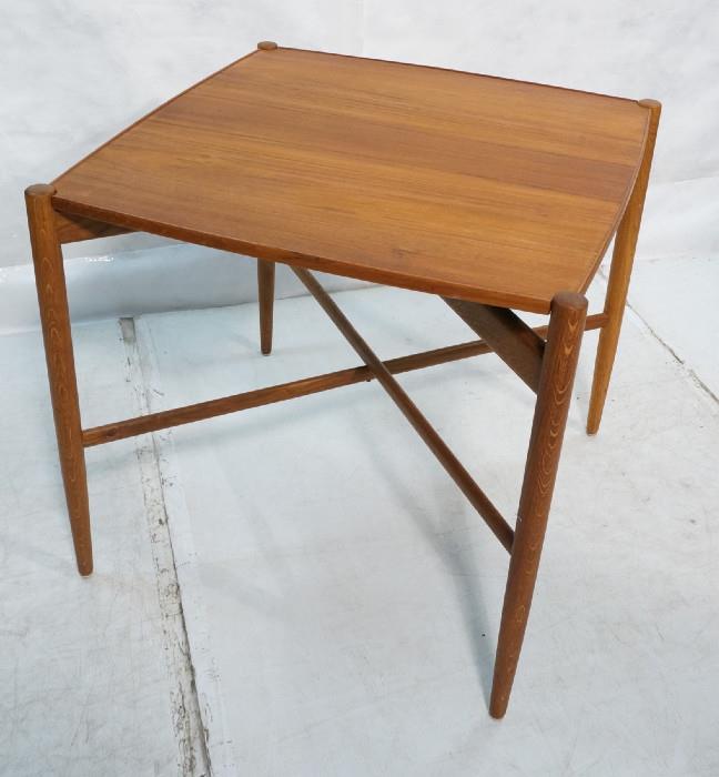 Lot 453  -  Square Danish Modern Teak Dining Table. Top flips to become game with green felt top. Tapered Peg Legs form Table top corners. "X" Stretcher. This table also folds to store away-- Dimensions:  H: 29 inches: W: 31.75 inches: D: 31.75 inches --- 