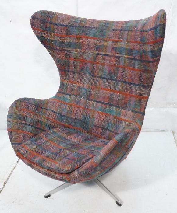Lot 452  -  FRITZ HANSEN Egg Lounge Chair. ARNE JACOBSEN. Pedestal Base. Colorful Plaid Upholstery. Marked.-- Dimensions:  H: 42 inches: W: 32 inches: D: 28 inches --- 
