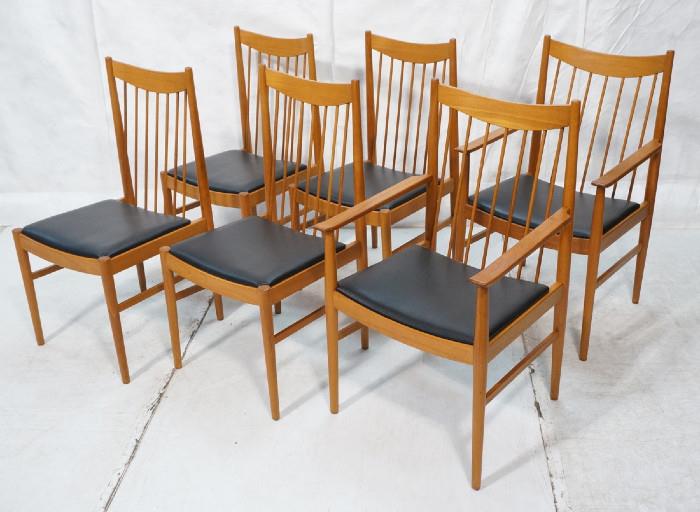 Lot 456  -  Set 6 ARNE VODDER Dining Chairs. Two Arms & 4 Side Chairs with thin spindle backs. Arched rail. Black leather seats. SEIBAST Label.-- Dimensions:  H: 38.5 inches: W: 22.25 inches: D: 20.5 inches --- 