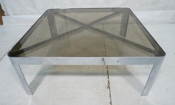 Lot 468  -  Large MILO BAUGHMAN style Coffee Cocktail Table. Square Chrome Steel Frame with Inset Smoked Glass Top. -- Dimensions:  H: 16.25 inches: W: 42.25 inches: D: 42.25 inches --- 