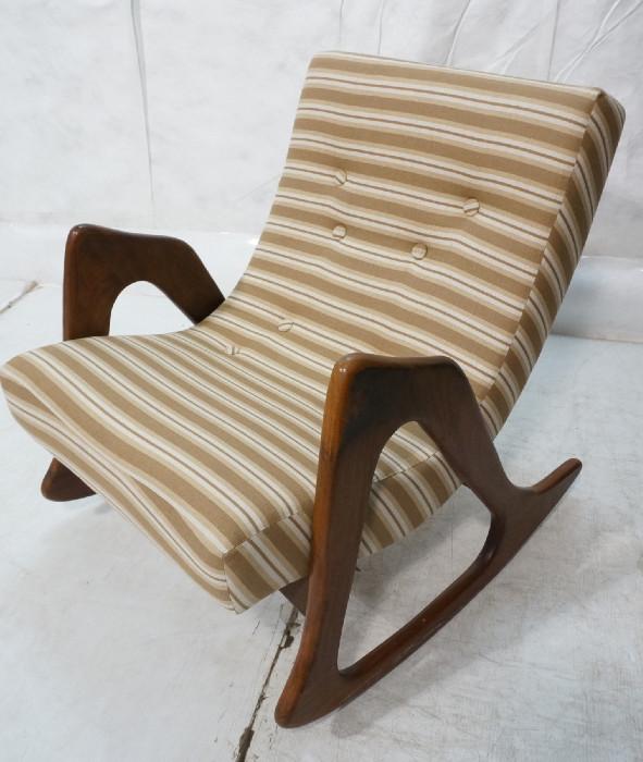 Lot 471  -  ADRIAN PEARSALL American Modern Walnut Rocker. Rocking Chair with Newer Upholstery.-- Dimensions:  H: 32 inches: W: 28 inches: D: 34 inches --- 