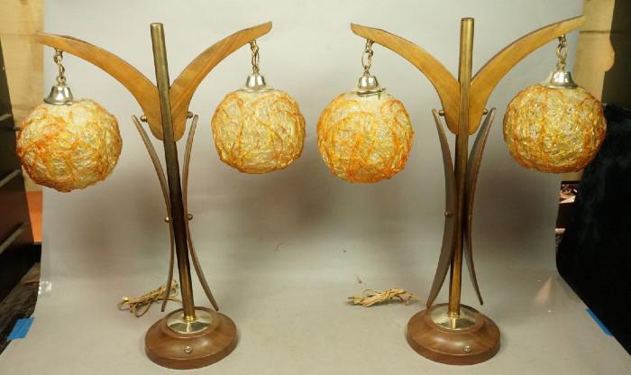 Lot 483  -  Pr Modernist Walnut Lamps. Dangling spaghetti spun plastic ball shades. -- Dimensions:  H: 28 inches: W: 22 inches: D: 7.5 inches --- 