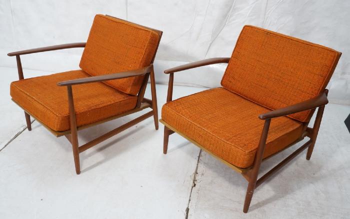 Lot 492  -  Pr SELIG Lounge Chairs. Wide Arms. Teak Danish Modern. Orange fabric seat & back cushions. Metal tags.-- Dimensions:  H: 26.5 inches: W: 30 inches: D: 28 inches --- 