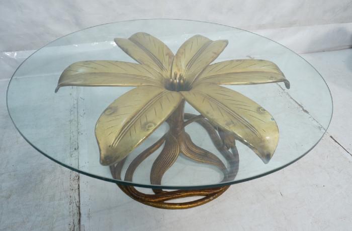 Lot 495  -  ARTHUR COURT Lg. Floriform Coffee Cocktail Table. Gilt Metal Flower Base. Round 1/2" Glass Top-- Dimensions:  H: 16.75 inches: W: 42 inches: D: 42 inches --- 
