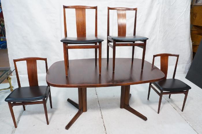 Lot 505  -  Rosewood Danish Modern Dining Set. Table. 4 Chairs. Asian inspired Chairs; black seat cushions.-- Dimensions:  H: 28.25 inches: W: 62 inches: D: 41.5 inches --- 