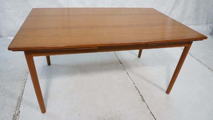 Lot 510  -  Teak Danish Modern Refractory Dining Table. Round Legs. Skirted top with pull out ends. -- Dimensions:  H: 29 inches: W: 58.5 inches: D: 37.25 inches --- 