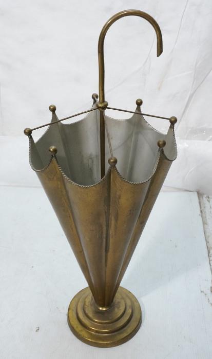 Lot 512  -  Decorator Modernist Umbrella form stand. Brass. Interior painted silver.-- Dimensions:  H: 31 inches: W: 13 inches: D: 13 inches --- 