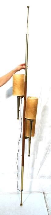 Lot 534  -  Modernist STIFFEL Tension Pole Floor Lamp. Brass Finish & Walnut. Parchment shades. Three lights. -- Dimensions:  H: 103.5 inches: W: 11 inches --- 