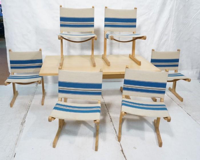 Lot 344  -  Ditte & Adrian Heath Dining Set for France and Sons.  Refractory Table and six cantilever chairs.  Oak with sling seats.-- Dimensions:  H: 27 inches: W: 67 inches: D: 35.5 inches --- 