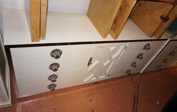 Lot 528  -  70's Modern White Lacquer Chrome Sideboard Credenza. 8 Drawers & 1 Door. Large Shiny Chrome Pulls. -- Dimensions:  H: 28.5 inches: D: 19 inches: L: 68 inches --- 