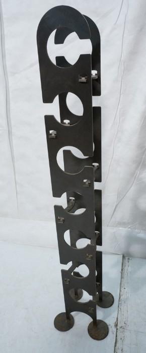 Lot 536  -  Tall Iron Wine Rack. modernist.-- Dimensions:  H: 55 inches: W: 12 inches: D: 12 inches --- 
