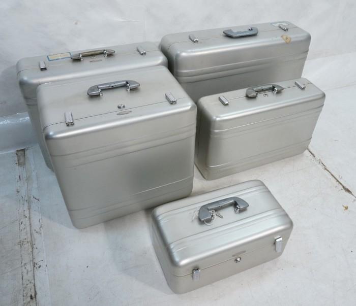 Lot 542  -  5pc Lot Aluminum Suitcases Luggage. HALLIBURTON label-- Dimensions:  H: 19 inches: W: 26 inches: D: 9 inches --- 