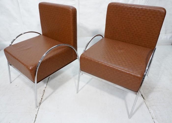Lot 560  -  Pr Oversized Contemporary Lounge Chairs. Brown leather with chrome tube frames. -- Dimensions:  H: 38 inches: W: 28 inches: D: 28 inches --- 