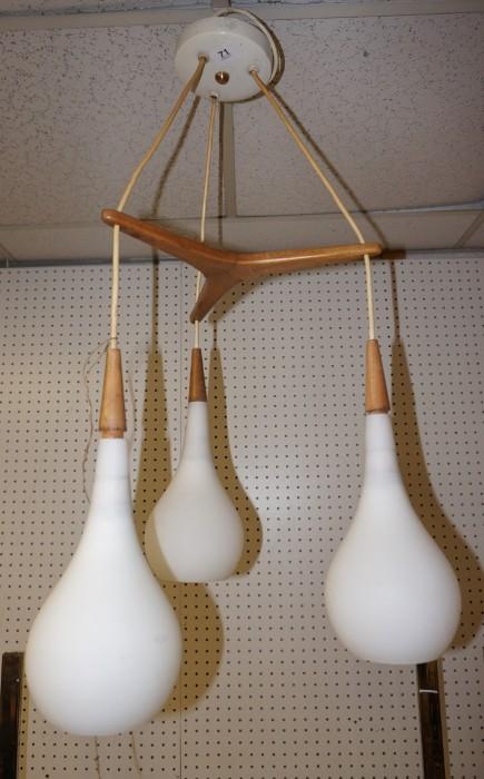 Lot 563  -  Modernist Hanging Pendant Light with 3 Glass Shades. Wood bracket & caps. Frosted glass shades. -- Dimensions:  H: 30 inches: W: 14.5 inches --- 