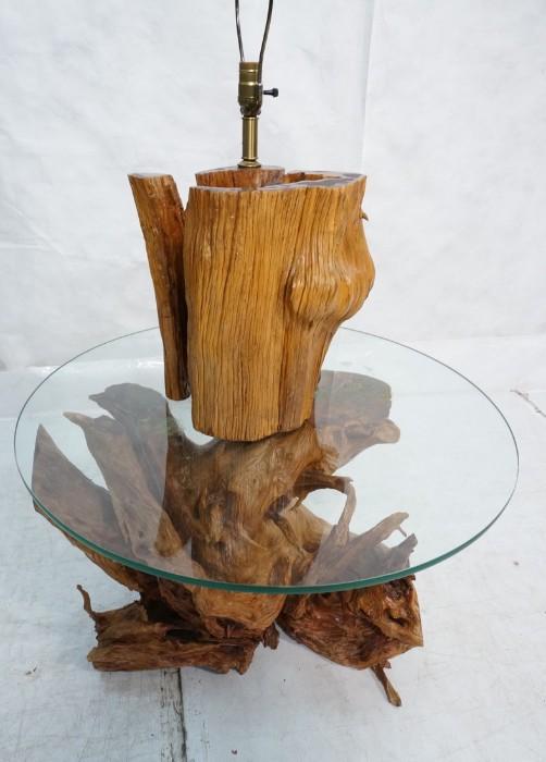 Lot 570  -  2pc Wood Tree Trunk Glass Top Table & Lamp. Large Wood Trunk with round glass top. With Tree Trunk Lamp. -- Dimensions:  H: 19 inches: W: 31 inches: D: 31 inches --- 
