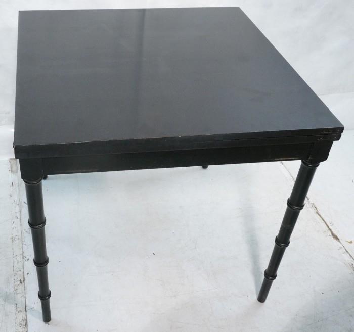 Lot 583  -  Ebonized Wood Square Extension Dining Table. Top flips open to double size. Legs slide apart. Tapered legs with banded detail.-- Dimensions:  H: 29.5 inches: W: 32 inches: D: 32 inches --- 