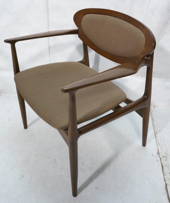 Lot 588  -  Danish Modern SELIG Arm Side Chair. Arched skirt. Paddle arms. Upholstered seat & back. Marked metal tag. -- Dimensions:  H: 29 inches: W: 27 inches: D: 21 inches --- 
