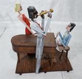 Lot 592  -  DERR Large Wood Sculpture. Piano. Pianist. Jazz Musician. With Blonde Female Singer. Tag from Discovery Gallery. -- Dimensions:  H: 39 inches: W: 34 inches: D: 19 inches --- 