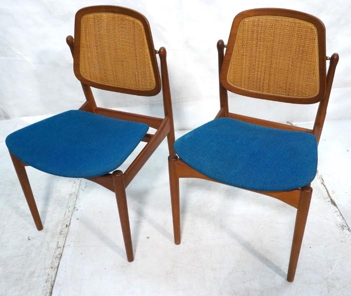 Lot 594  -  Pr Caned Back Side Chairs. Teak Danish Modern. Teal upholstered seats. Metal FD Tag-- Dimensions:  H: 34 inches: W: 20 inches: D: 20 inches --- 