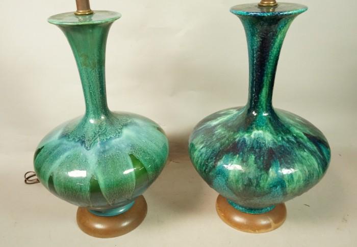 Lot 597  -  Pr Pottery Blue Turquoise Glazed Table Lamps. Wood base & finials. -- Dimensions:  H: 38 inches: W: 14 inches: D: 14 inches --- 