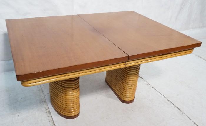 Lot 608  -  PAUL FRANKL Dining Table. Rattan Pedestal bases. -- Dimensions:  H: 30 inches: W: 42 inches: D: 58.5 inches --- 
