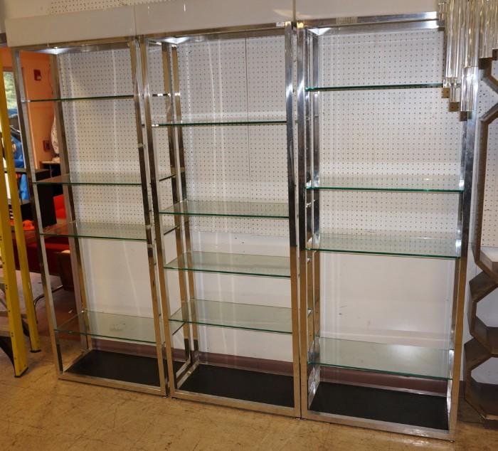 Lot 609  -  3pc Chrome Shelf Wall Units Etageres. Each with four shelves. White acrylic tops can light up. Each can stand independently. -- Dimensions:  H: 83 inches: W: 30 inches: D: 14.5 inches --- 