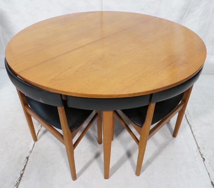 Lot 631  -  Round Hans Olsen style Dining Table with Four Nesting Dining Chairs. Black vinyl seats, chair backs and table skirt. Four legged chairs. Not marked-- Dimensions:   --- 