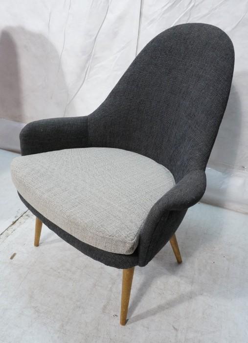 Lot 640  -  Modernist style Heather Gray Arm Side Chair. Contrasting cushion seat. Tapered peg legs. -- Dimensions:  H: 37 inches: W: 28 inches: D: 23 inches --- 