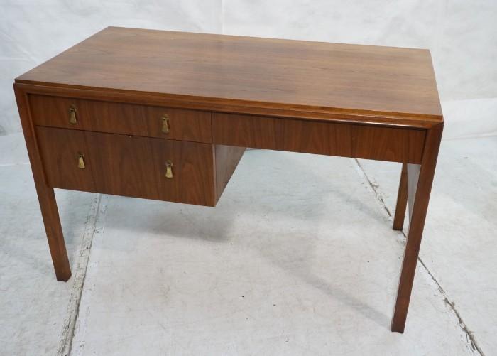 Lot 717  -  American Modern Walnut Desk. Three Drawers with metal pulls. Mount Airy Furniture label. -- Dimensions:  H: 29.5 inches: W: 47 inches: D: 24 inches --- 
