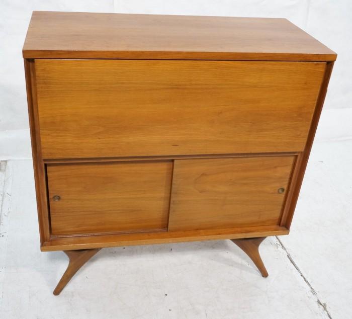 Lot 719  -  American Modern Walnut Drop Front Bar Cabinet. Interior with mirror back and fitted for glasses & bottles. Raised on Pearsall style legs. -- Dimensions:  H: 37.75 inches: W: 36 inches: D: 16 inches --- 