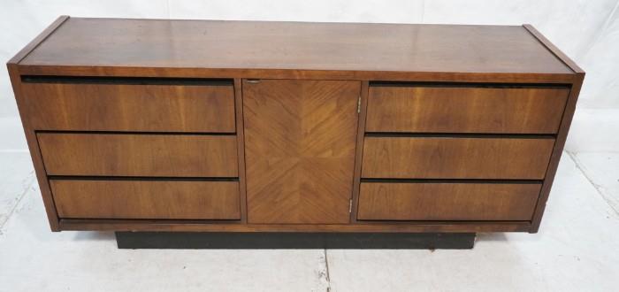 Lot 721  -  American Modern Walnut LANE Credenza Dresser. 6 drawers, 1 door. Black platform base.-- Dimensions:  H: 29 inches: D: 18 inches: L: 66 inches --- 