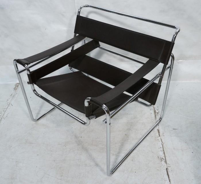 Lot 734  -  Wassily style Black Leather Lounge Chair. Chrome Tubular frame. Possibly Knoll; not marked-- Dimensions:  H: 29 inches: W: 30.25 inches: D: 26 inches --- 