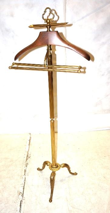 Lot 742  -  Brass & Wood Standing Valet. Decorative details. -- Dimensions:  H: 51.5 inches: W: 19 inches --- 