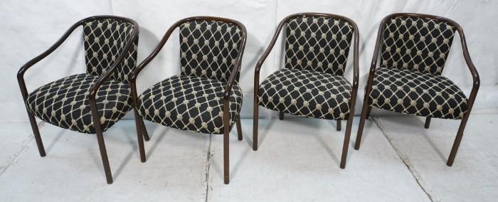 Lot 766  -  4pc Side Dining Arm Chairs. Curved Wood Frames with upholstered seat and backs. Black fabric with heads.-- Dimensions:  H: 32 inches: W: 24 inches: D: 24 inches --- 