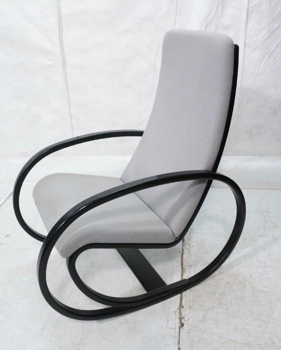 Lot 773  -  Ebonized Wood Danish Rocker Rocking Chair. ERIK JORGENSEN MOBLEFABRIK, Denmark.  Upholstered sling seat and back. Marked.-- Dimensions:  H: 41 inches: W: 23 inches: D: 36 inches --- 