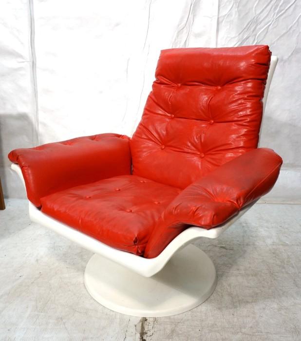 Lot 798  -  Molded Plastic Red Vinyl Lounge Chair. -- Dimensions:  H: 36 inches: W: 36 inches: D: 34 inches --- 
