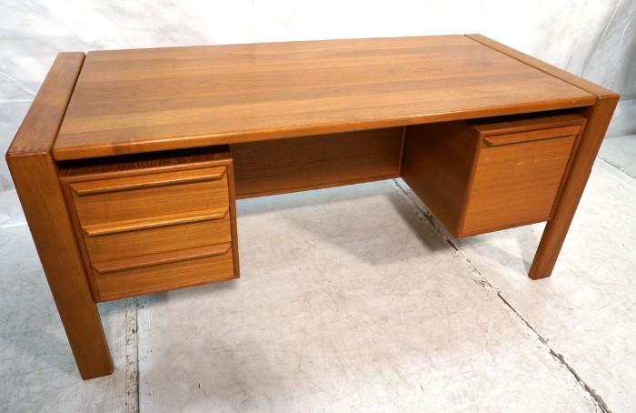 Lot 799  -  Modernist Teak Desk. Four drawers. -- Dimensions:  H: 28.5 inches: W: 64 inches: D: 29.5 inches --- 