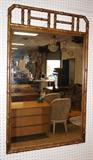 Lot 801  -  Metal Faux Bamboo Wall Mirror. Antiqued paint finish-- Dimensions:  H: 46 inches: W: 28.25 inches --- 