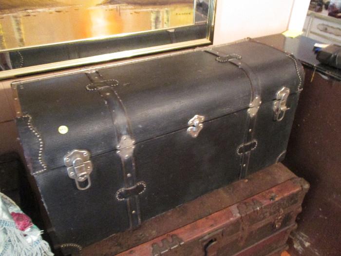 An original 1920's - 1030's automobile trunk.  Back in those days you added a 'trunk' to a back rack when traveling on long trip hence why we call back part of today's cars the 'trunk'.  This trunk originally belonged to the Schwartz Family of Ennis and came off a Packard automobile.   This is a beautiful survivor that would be a great addition to your restored classic 1930's Ford Model A, Chevy, Buick, Cadillac, Cord, Pierce Arrow,  Packard, Lincoln, or even that extra touch for that rat rod.   It would also simply look cool in a man cave.  
