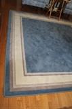 There are a set of these great area rugs, with matting to hold them in place