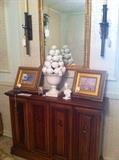 Nice entryway piece with hand carved Italian mirror.