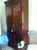 Nice beveled glass lighted display cabinet.